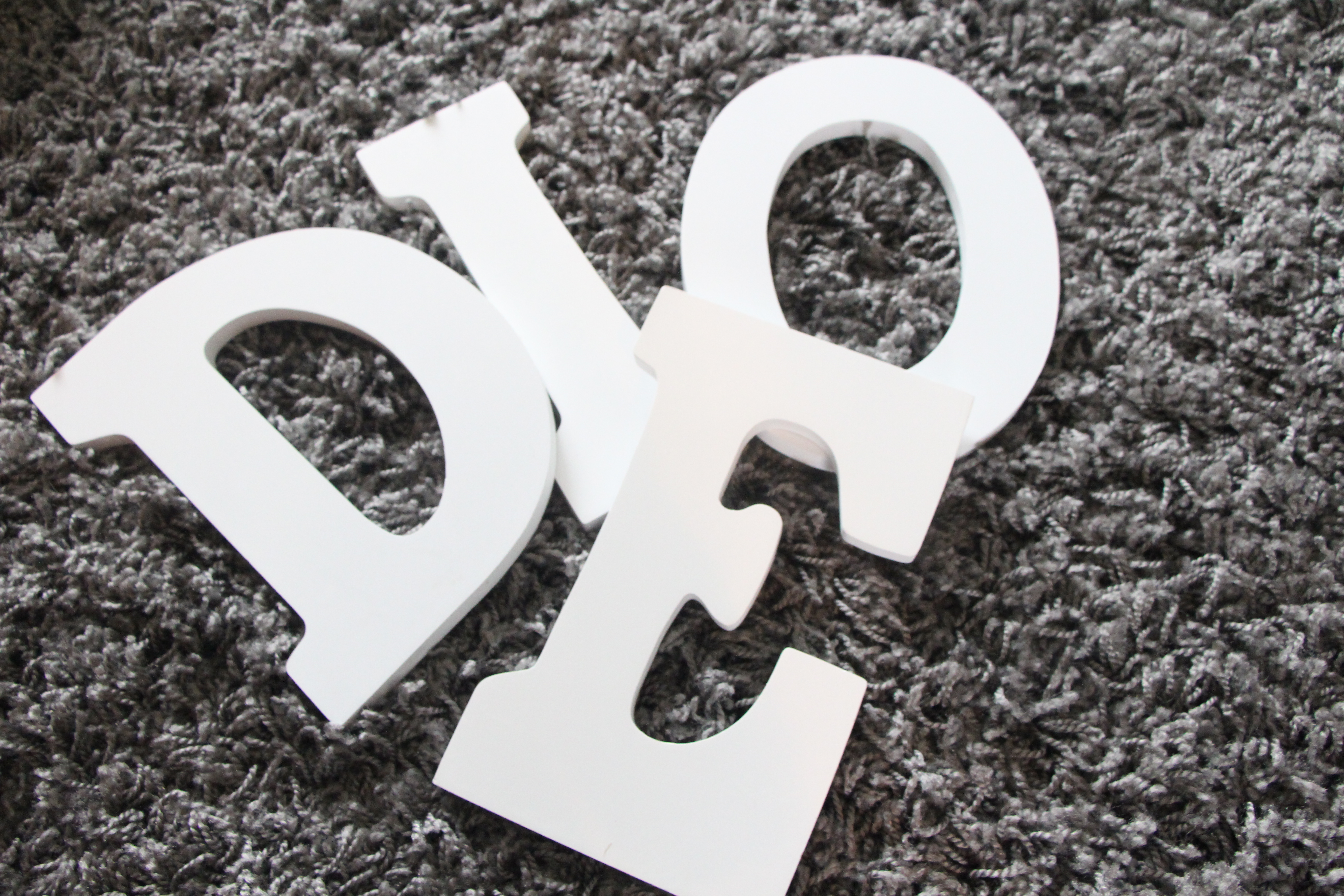 white wooden letters for marquee reading wall