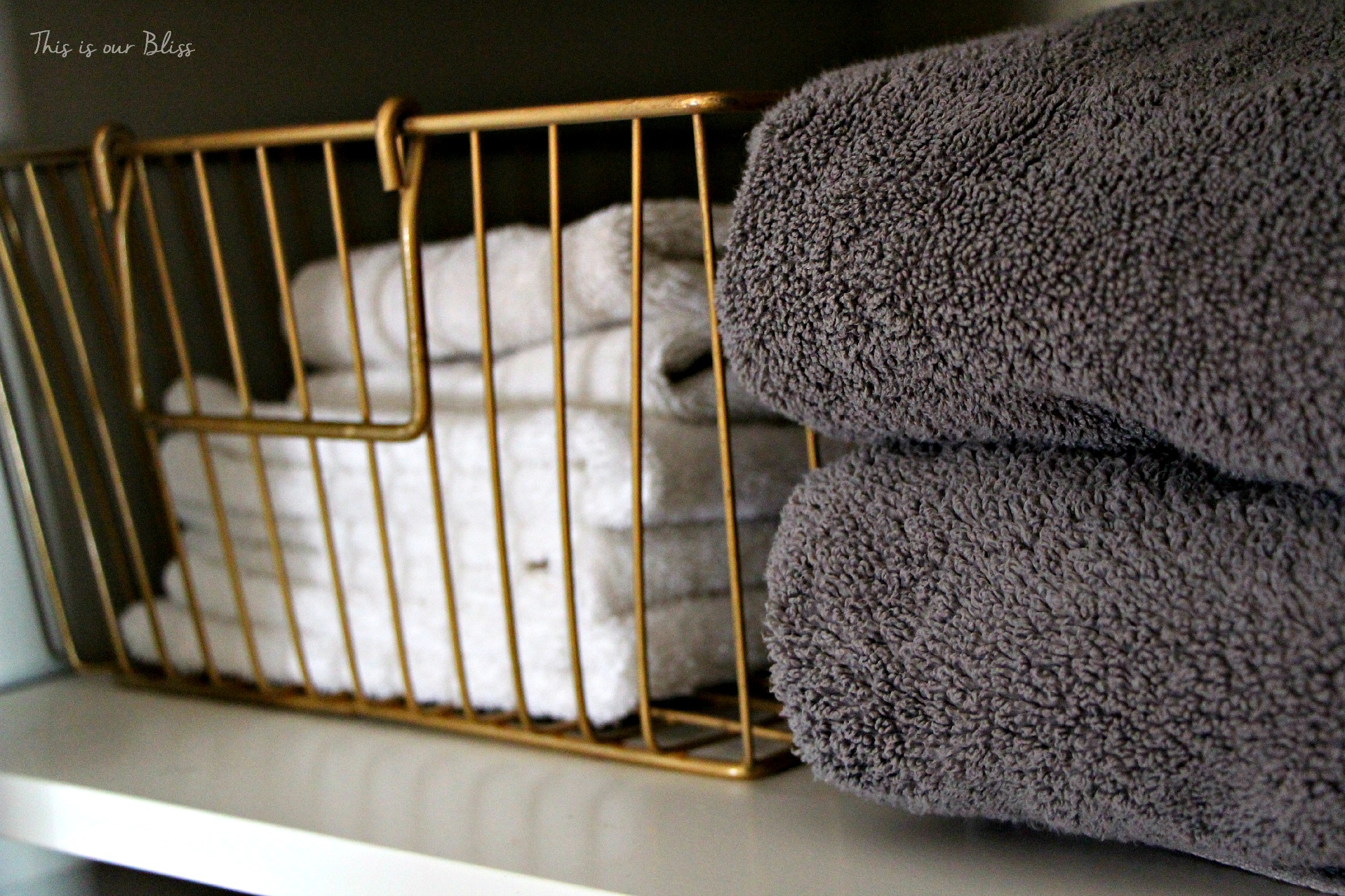 Linen closet makeover - gold basket - declutter & organize - This is our Bliss