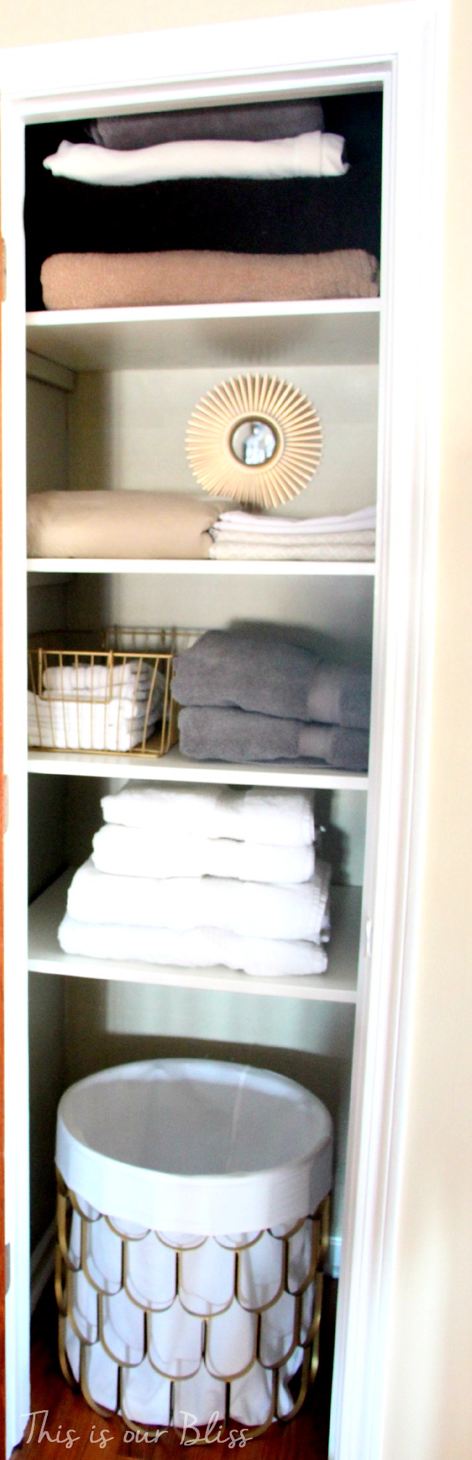 small space storage solutions - simplify linen closet - This is our Bliss