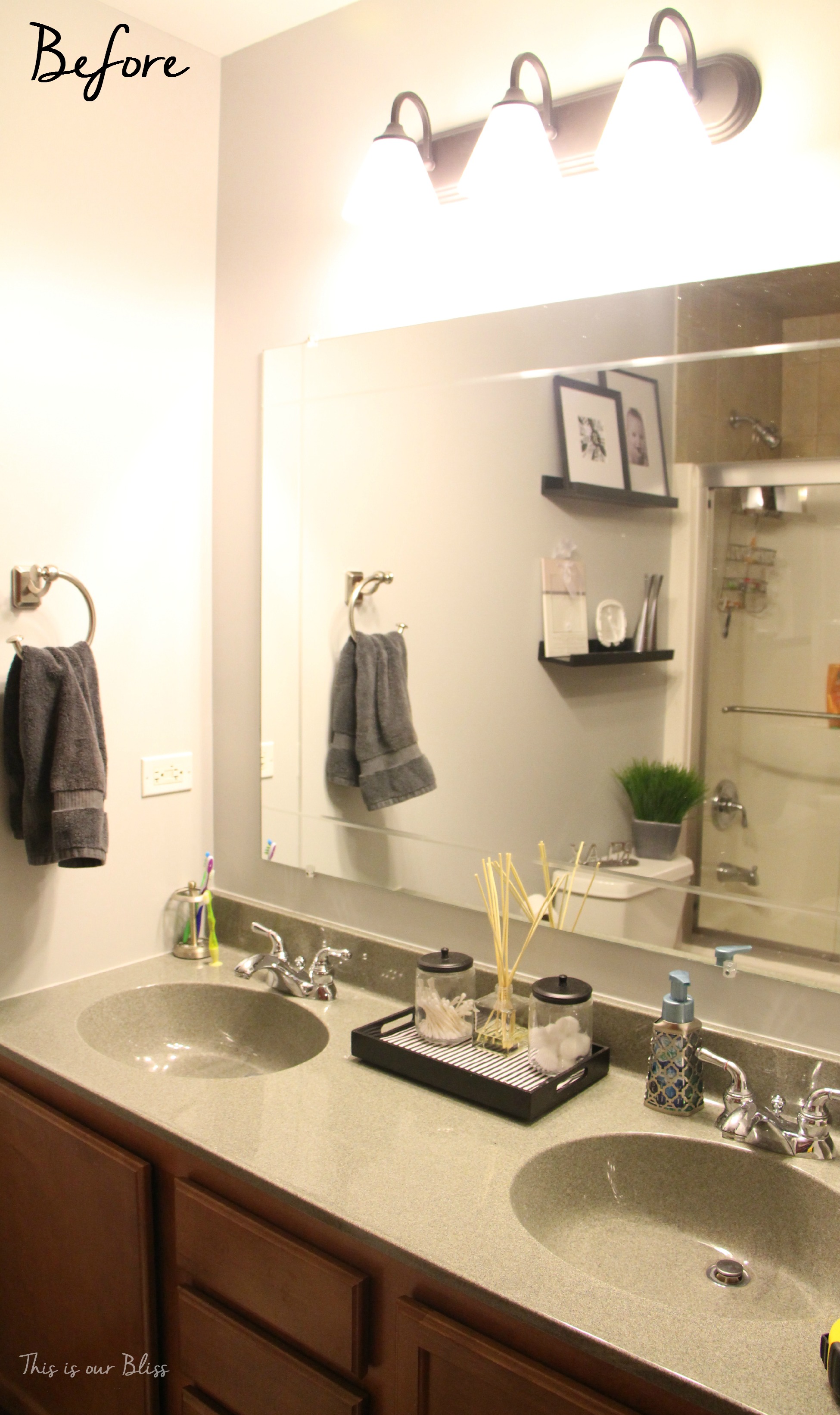 Simple Bathroom Vanity Light Fixture Update - This is our ...