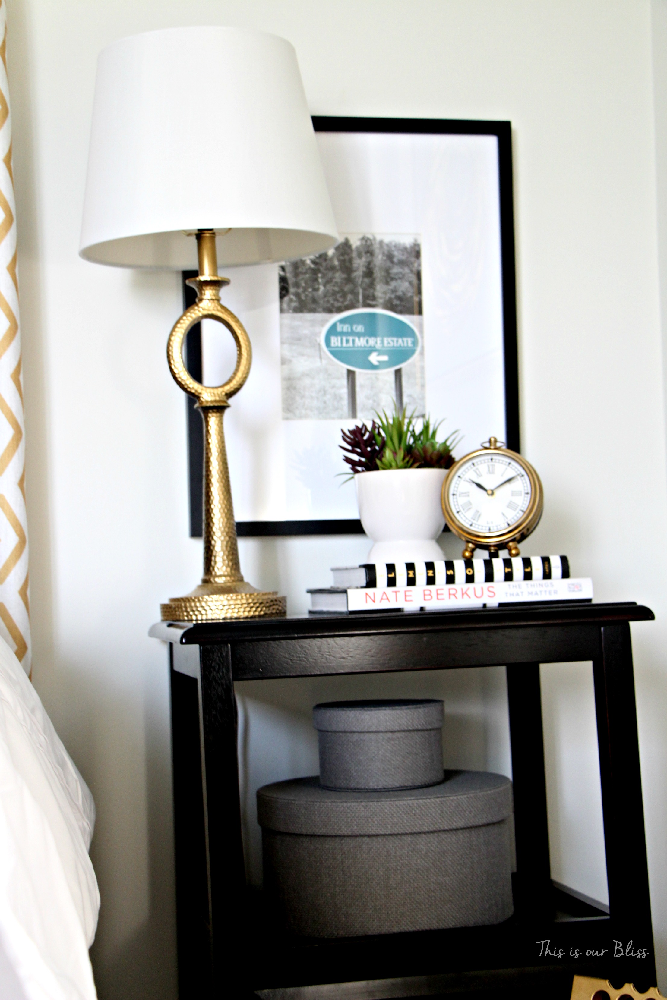 Guestroom revamp - bedside table - gold lamp & clock - succulent - Nate Berkus book -This is our Bliss