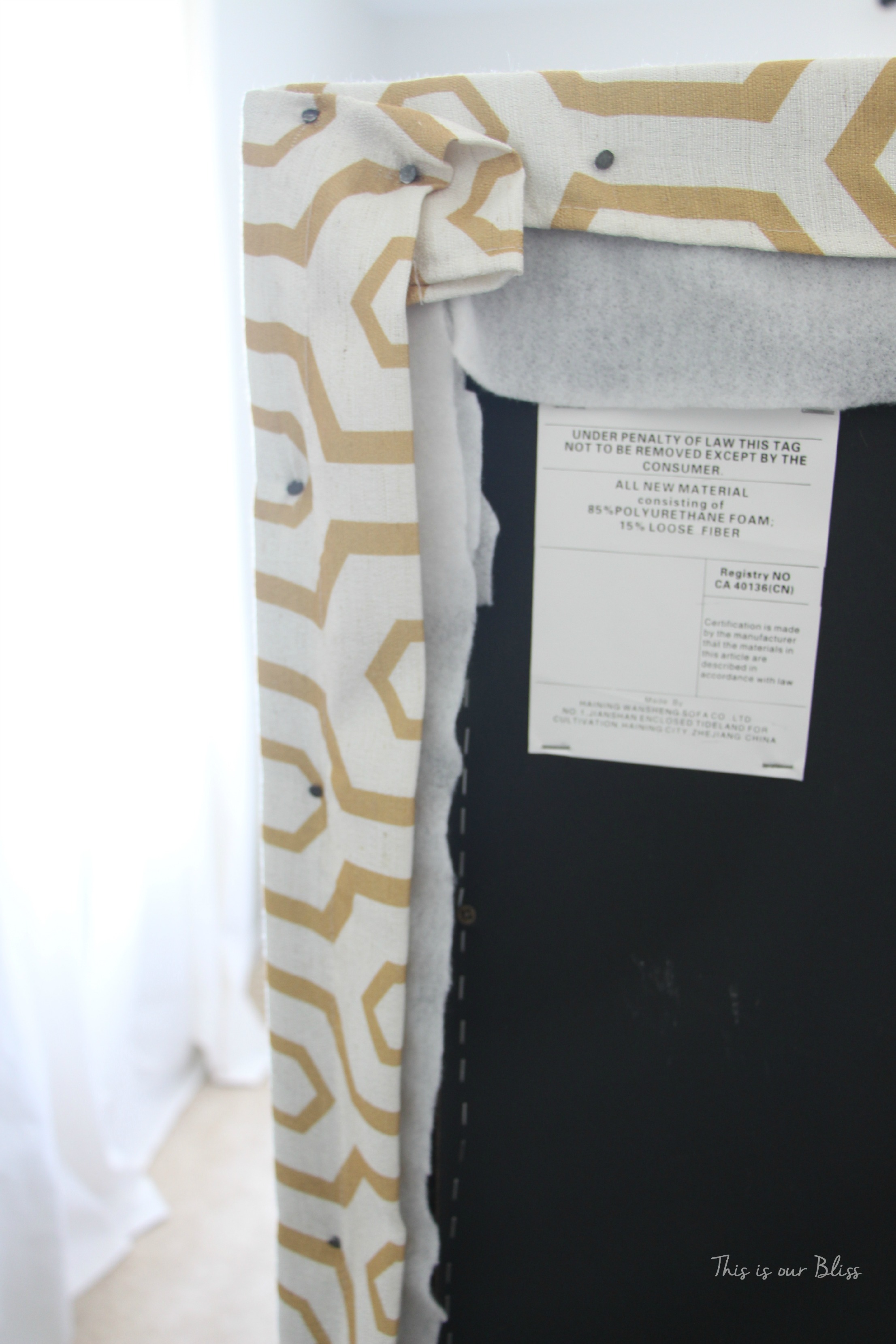 how to reupholster a headboard with a curtain panel - tack up and down sides and top of headboard - this is our bliss