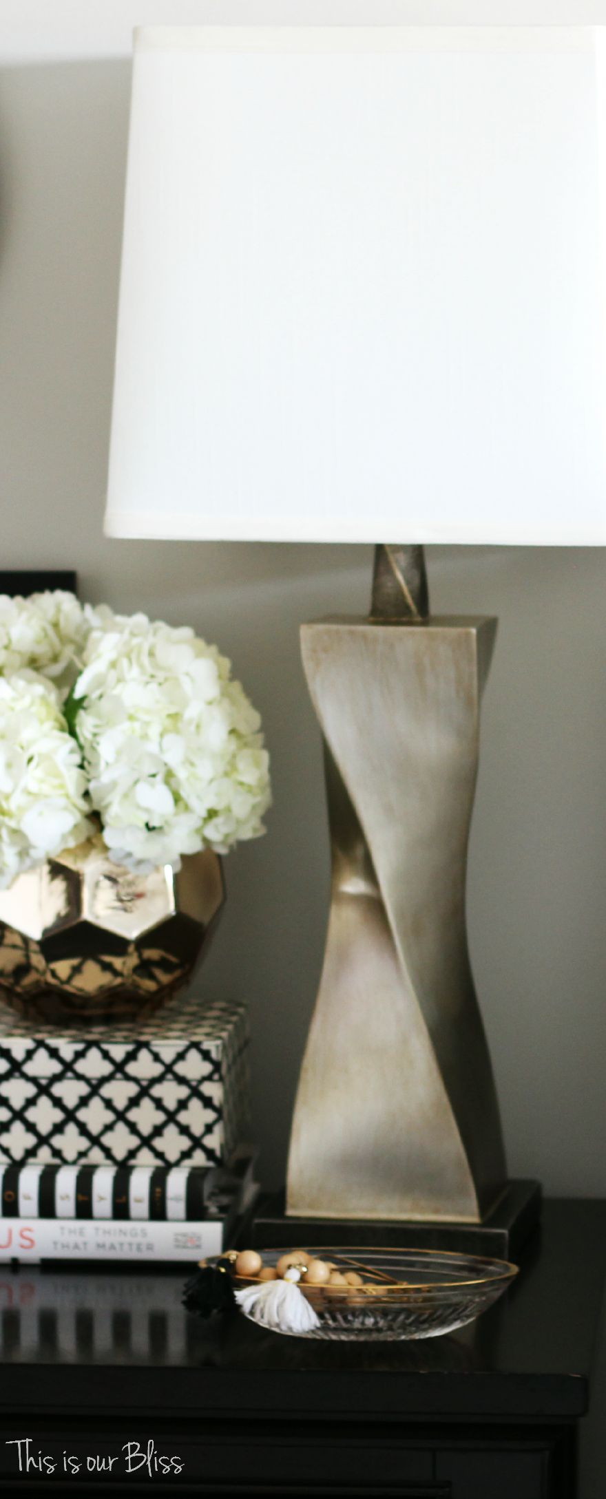How to style a nightstand - elements of a well-styled nightstand - bedside table styling - view from the bed - lamp - This is our Bliss